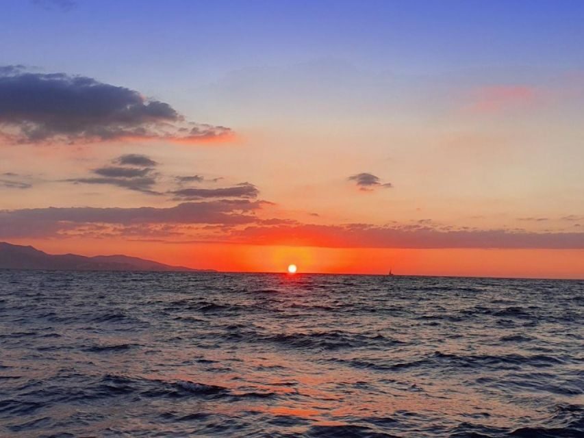 Chania: Private Day Catamaran Cruise with Swimming and Meal - The meal at sea: Mediterranean lunch, seafood and meat, and drinks that keep flowing