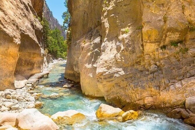 Full Day Tour Samaria Gorge From Rethymno - Mid-Hike Scenery: Rivers, Rocks, and the Gorge’s Long Descent